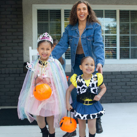 A family trick-or-treating